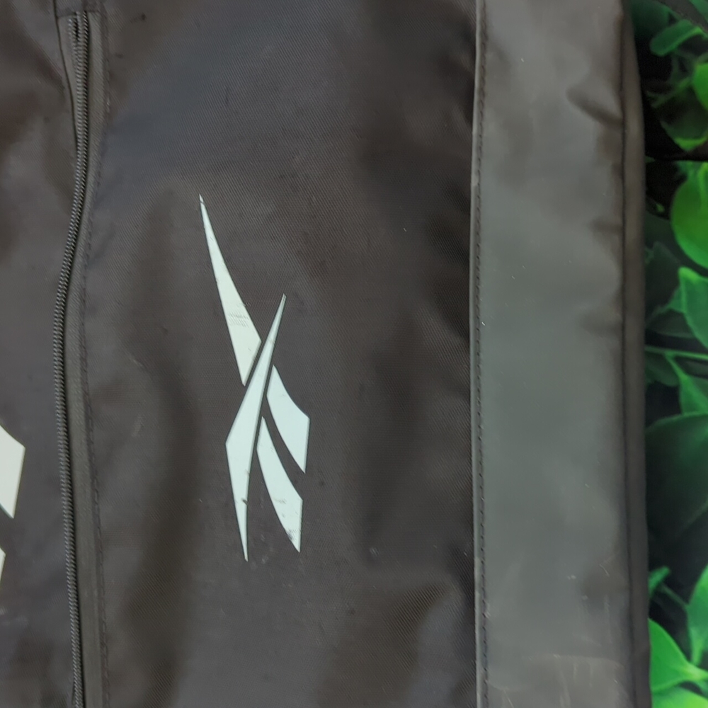 Black Reebok Backpack With Unique Tiered Zipper Pocket Design - Picture 9 of 15